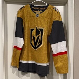 Golden Knights Hockey Jersey with Black and Red Accents